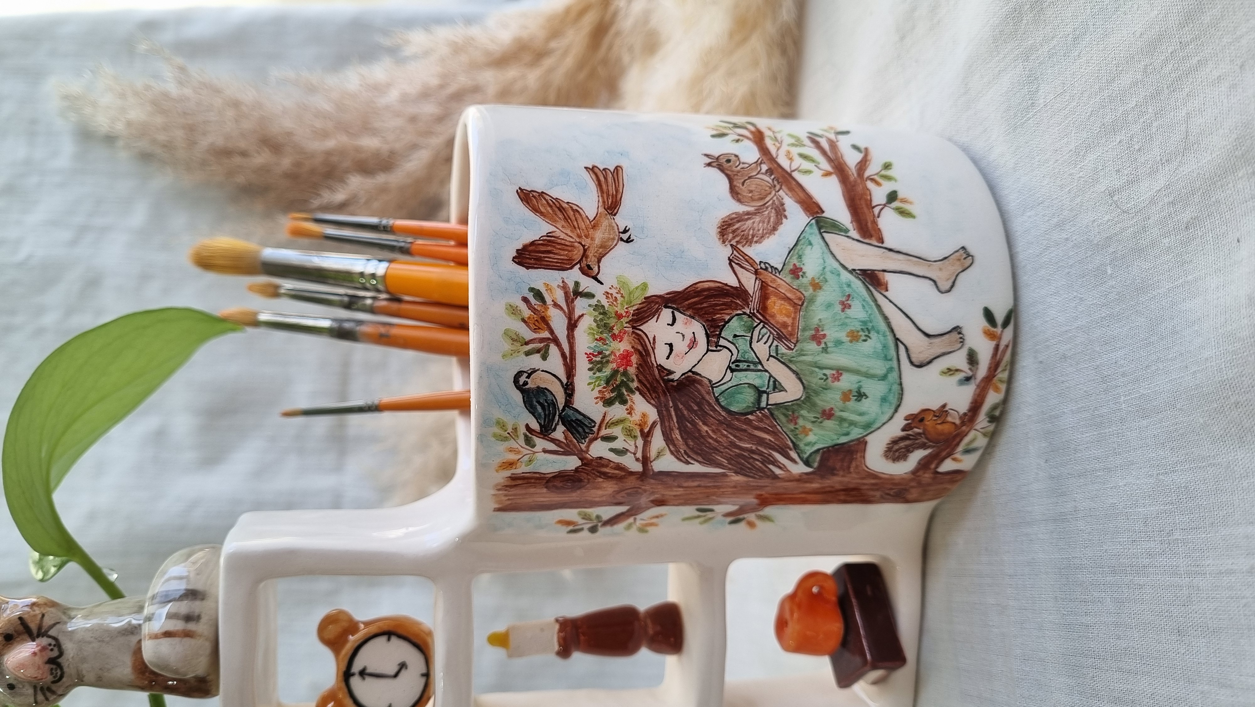 Handmade ceramic desk pen holder with autumn girl design