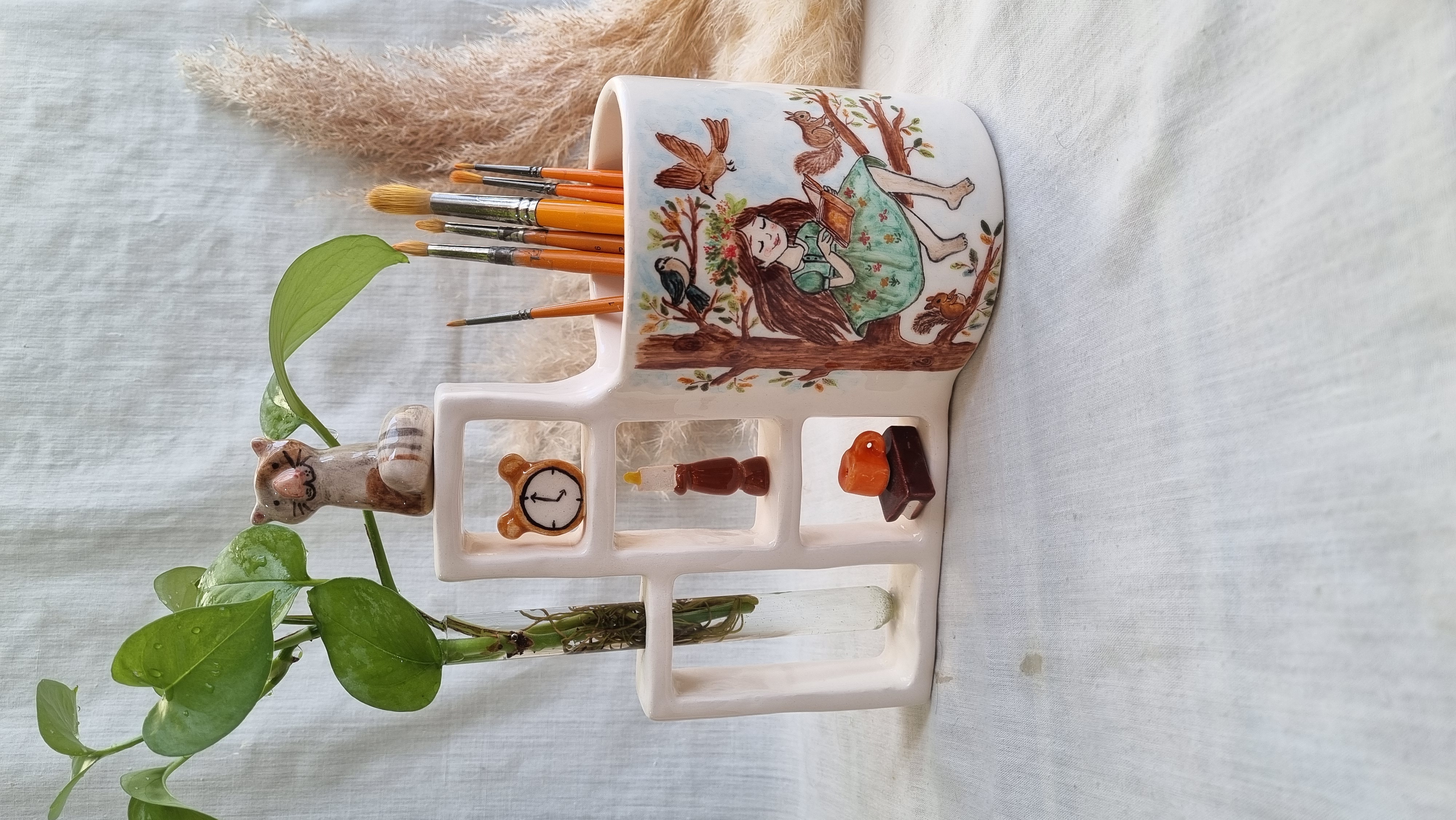 Handmade ceramic desk pen holder with autumn girl design